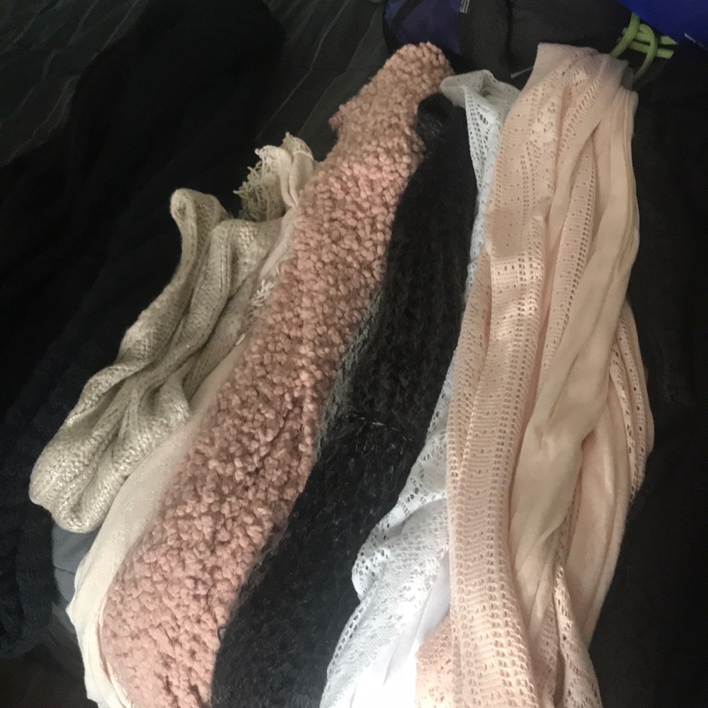 16 scarves one is a soft white Calvin Klein.